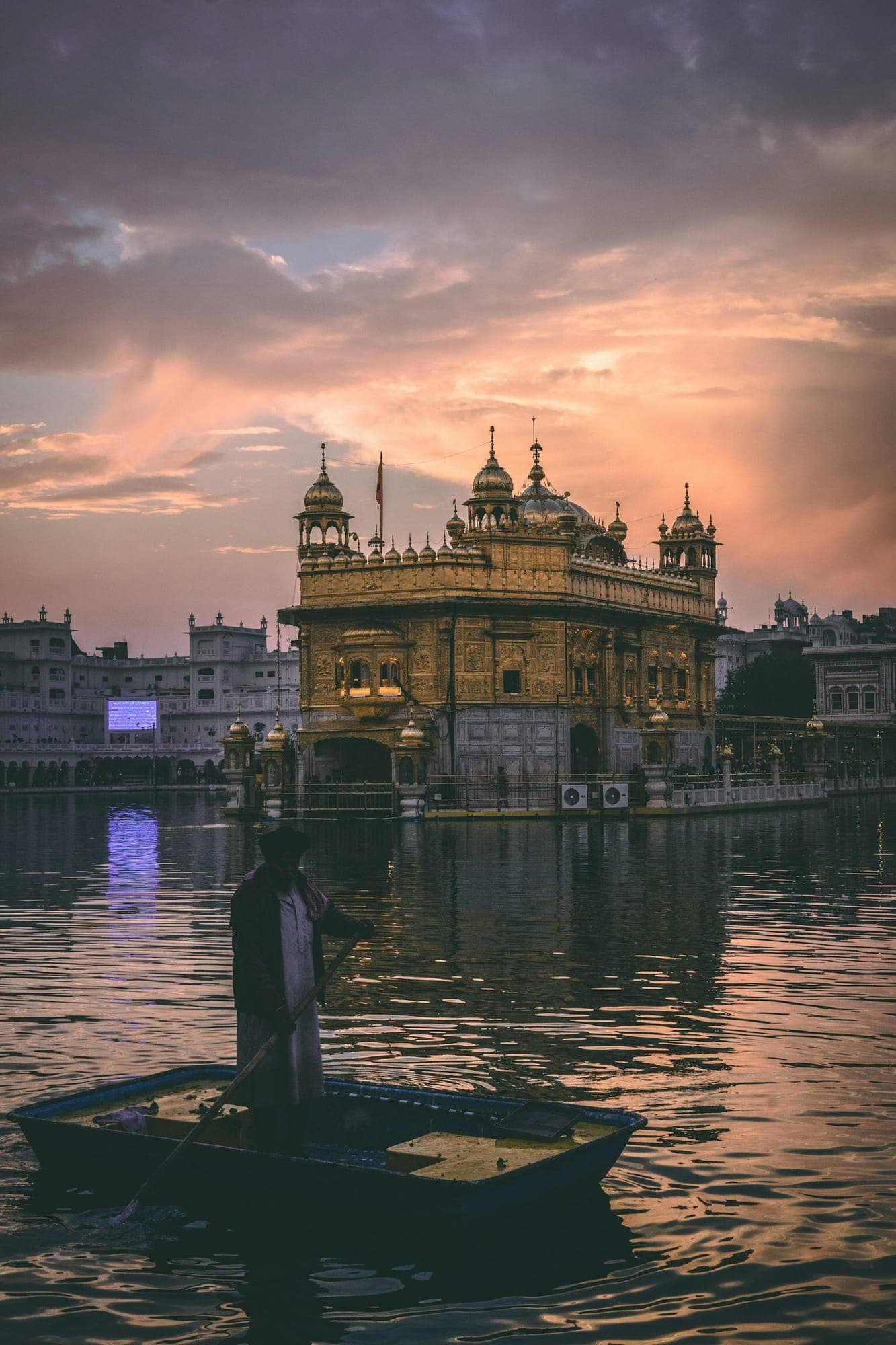 Golden Temple glowing at dusk in Amritsar
